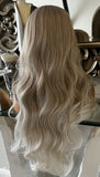 Christina - blonde on blonde platinum bodywave centre part