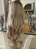 Side part creamy blonde unit with dark root