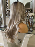 Side part creamy blonde unit with dark root
